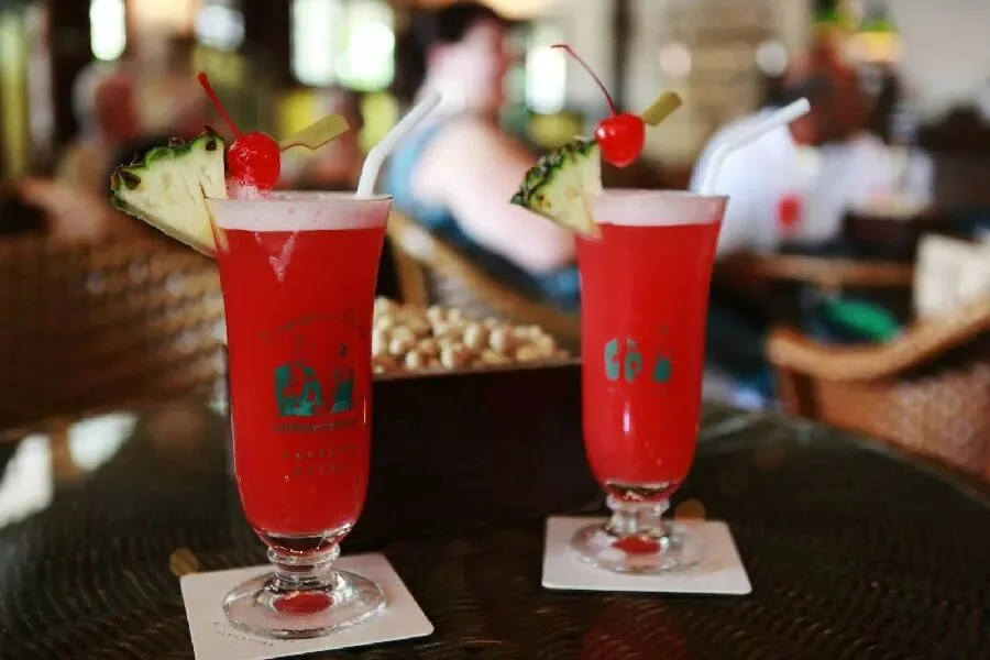 Two Singapore Slings made with Raffles 1915 gin