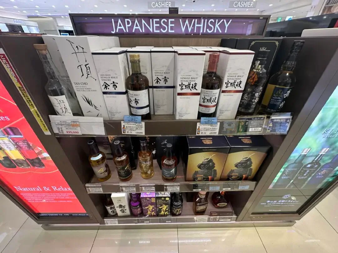 The Japanese whisky shelf at Kansai, with Yoichi and Miyagikyo side by side