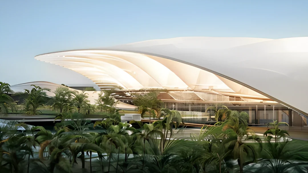Rendering of the new Al Maktoum terminal: a long white roof shaped like a Bedouin tent, with water and planting in front