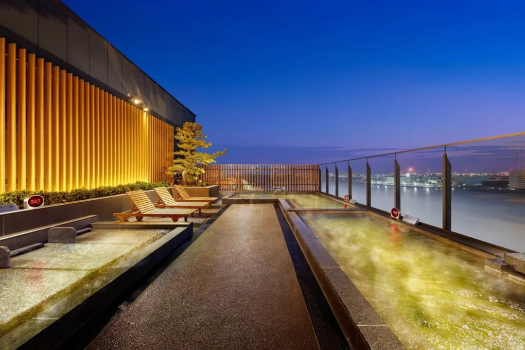 The outdoor terrace at Haneda Airport Garden at dusk