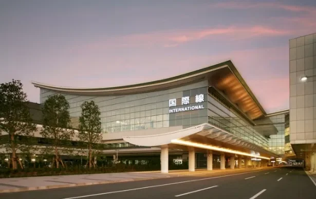 The international departures hall of Haneda Terminal 3 at dusk