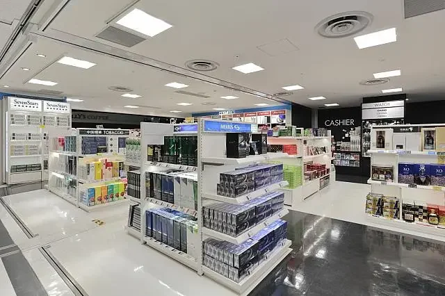 Shelves of alcohol and cosmetics in a duty-free shop at Kansai International Airport