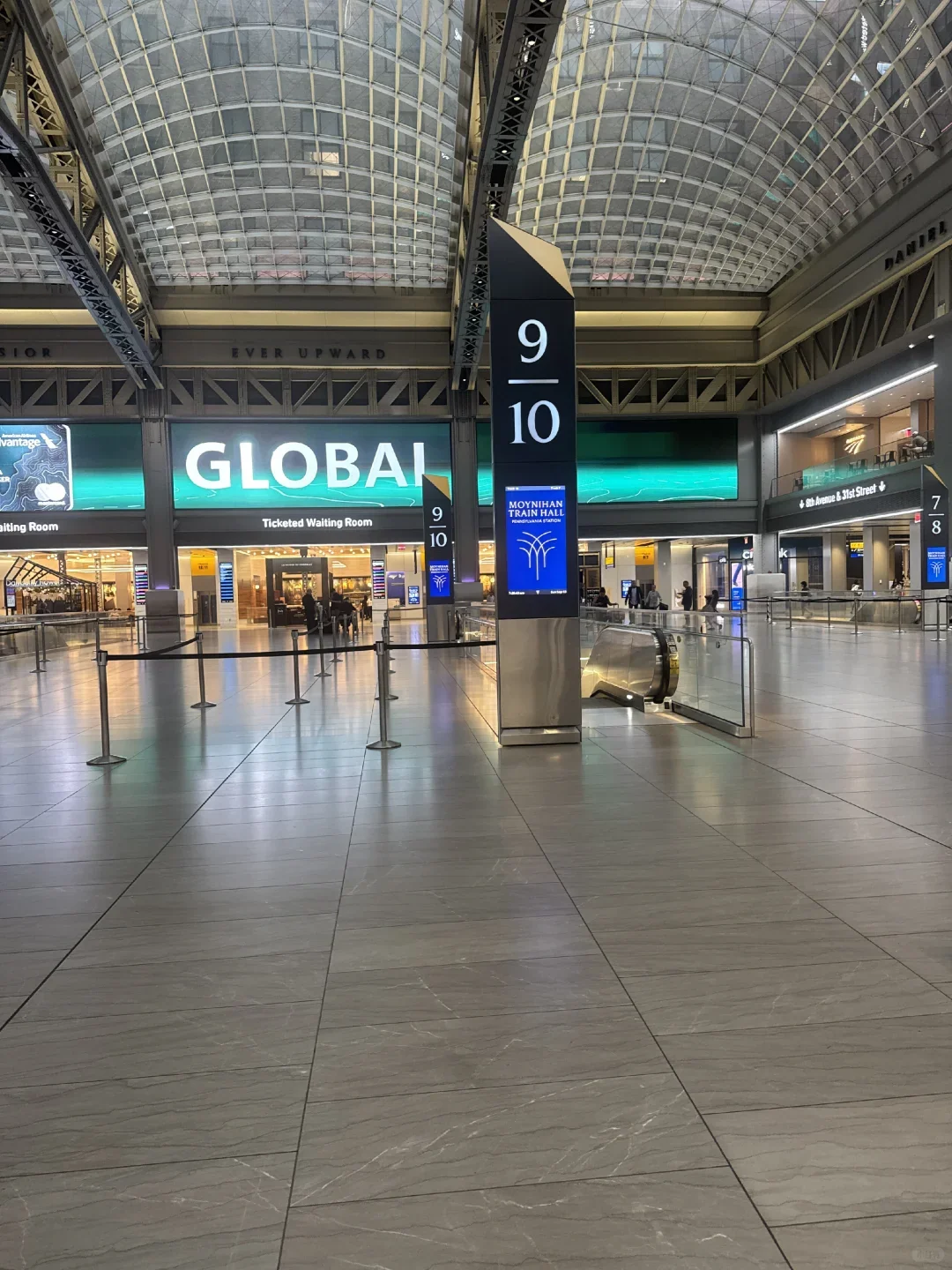 The waiting area and platform pillars inside Moynihan Train Hall