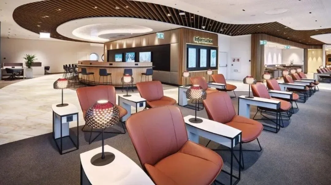 Seating and work tables in a Priority Pass partner lounge