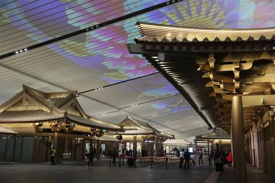 The departures hall at Terminal 5, with shops and seating along the central axis
