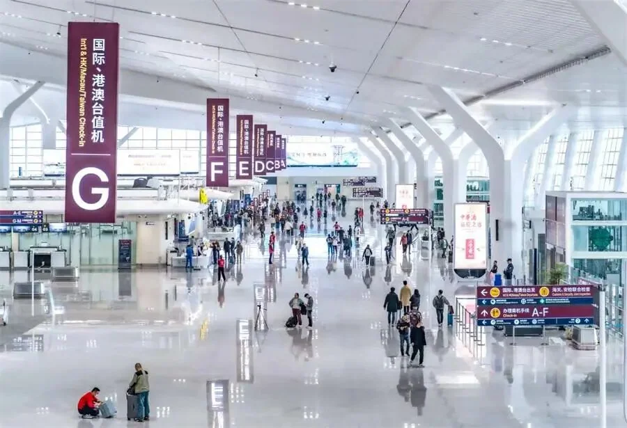 The check-in hall at Terminal 5, with islands for international and regional flights
