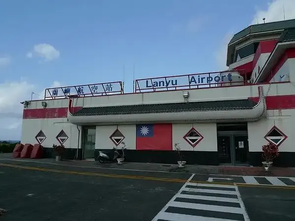 Lanyu Airport's terminal, lettered "Lanyu Airport" across its red-and-white facade.