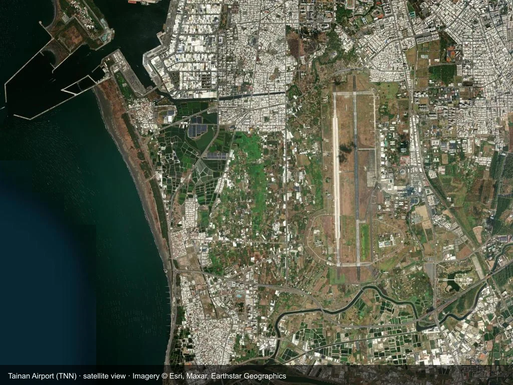 In the satellite image, the layout of Tainan Airport (TNN) and its surroundings are clearly visible.