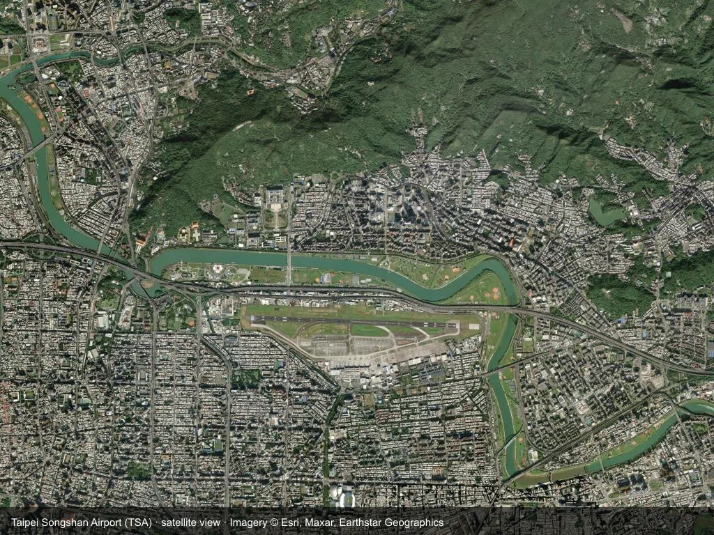 In the satellite image, the layout of Taipei Songshan Airport (TSA) and its surroundings are clearly visible.